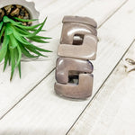 Lyla bracelet gray showcasing a sleek matte finish with bold geometric gray links for a modern look