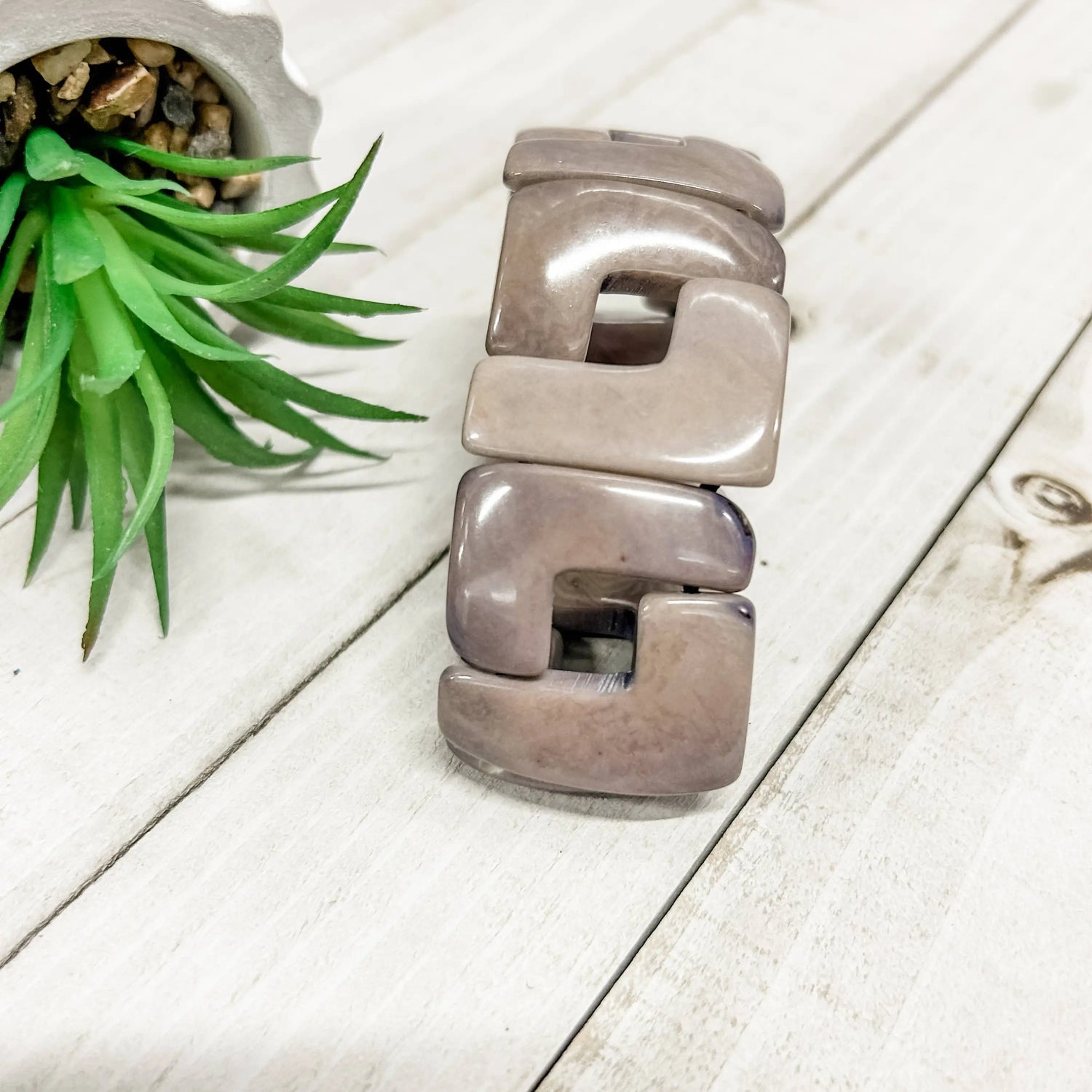 Lyla bracelet gray showcasing a sleek matte finish with bold geometric gray links for a modern look