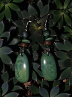 Magnificent galaxy green natural grain tagua earrings with green jade-like oval pendants and layered green brown gray beads