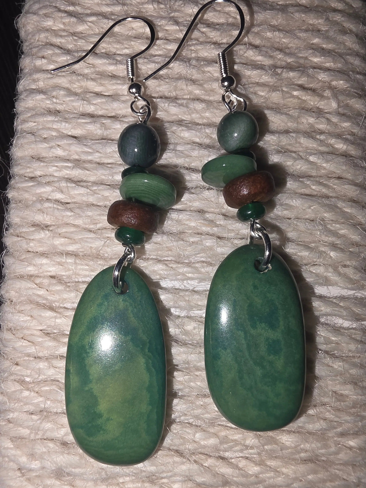 Magnificent galaxy green natural grain tagua green stone pendant earrings with layered beads and silver hooks