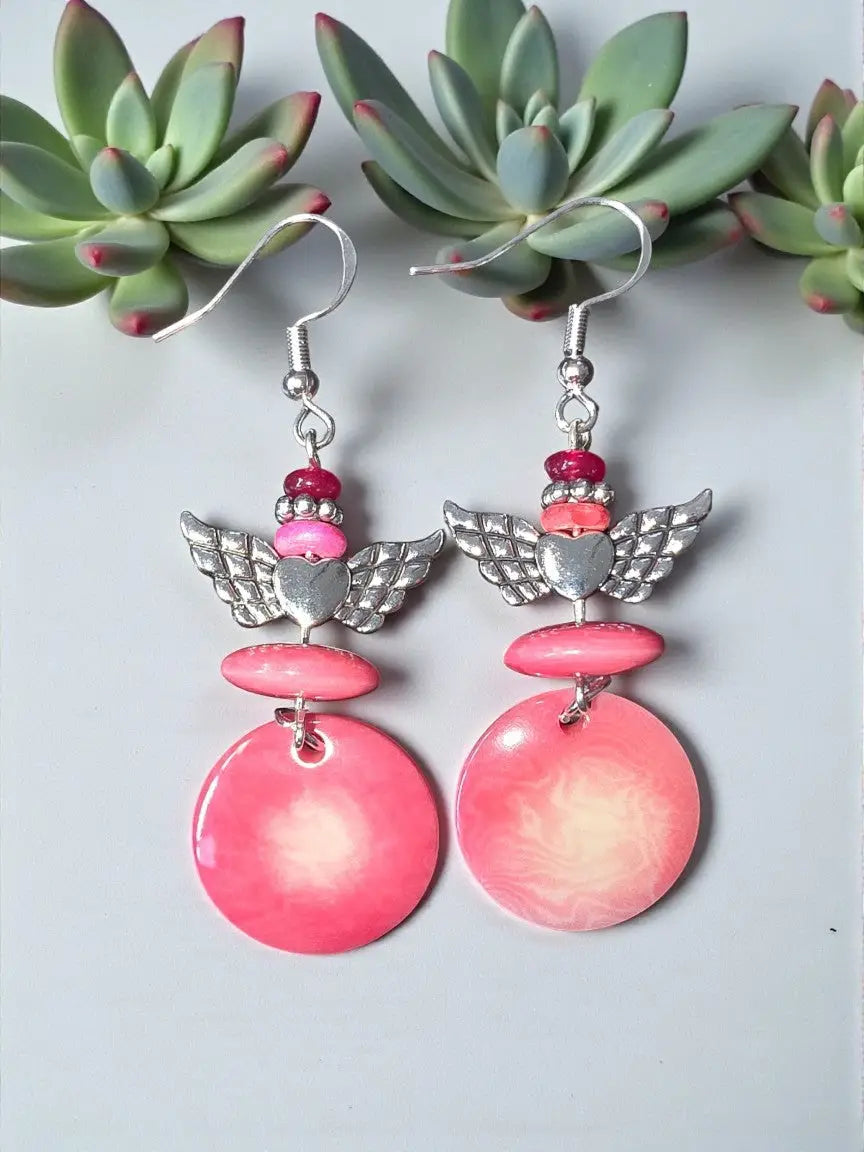 Pink angel-themed dangle earrings with silver wings heart charms and gradient pink pendants from turquoise misty collection