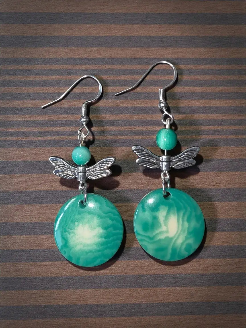 Teal dragonfly dangle earrings with silver-toned metal wings and marbled green disc pendant eco-friendly vegetable ivory