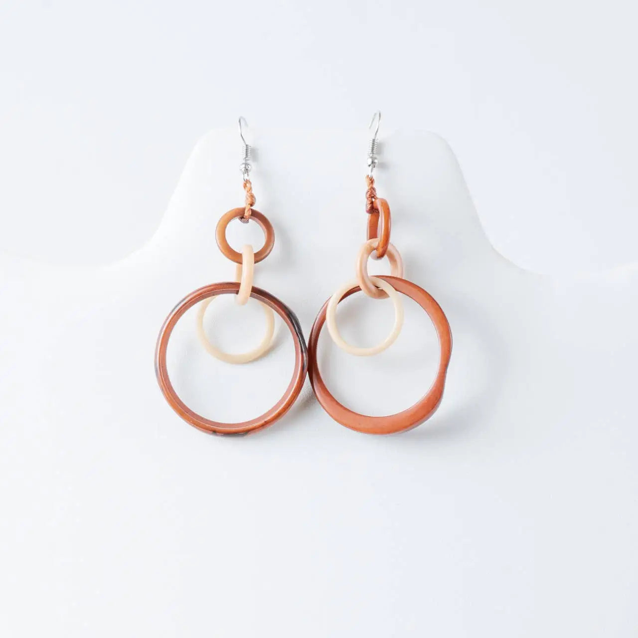 Terracotta and cream circular layered hoop tagua earrings with an interlocking design perfect for statement wear