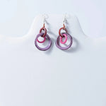 Purple and pink glass mona drop and dangle circle statement tagua earrings with copper wire accent