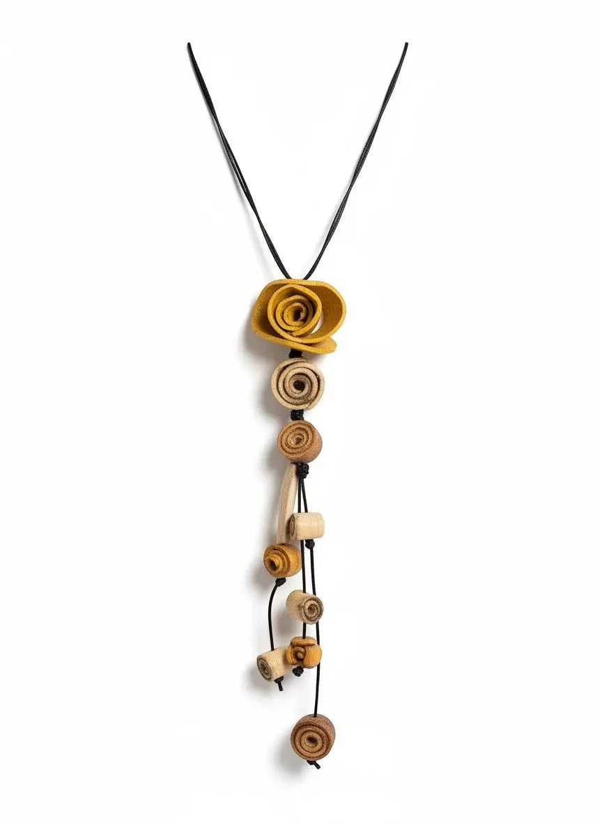 A delicate mustard yellow orange peel flower necklace made with eco friendly materials and wooden spiral beads