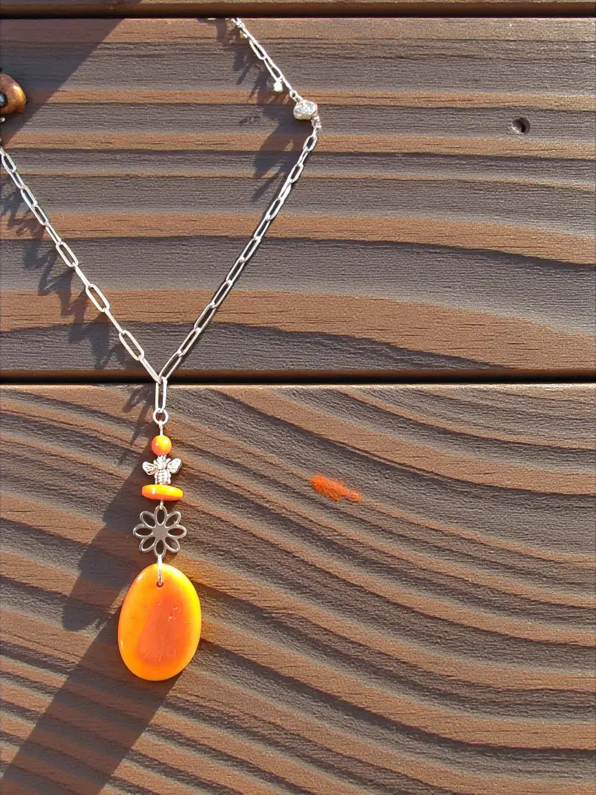Silver chain orange tagua necklace with bee and flower charms fair trade vegetable ivory jewelry gift