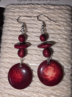 Pretty crimson burgundy round disc tagua grain earrings with deep red glossy marbled wooden discs and silver hooks