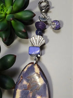 Purple natural carved tagua bag charm with marbled pendant silver shell charm blue bead and crystal accent