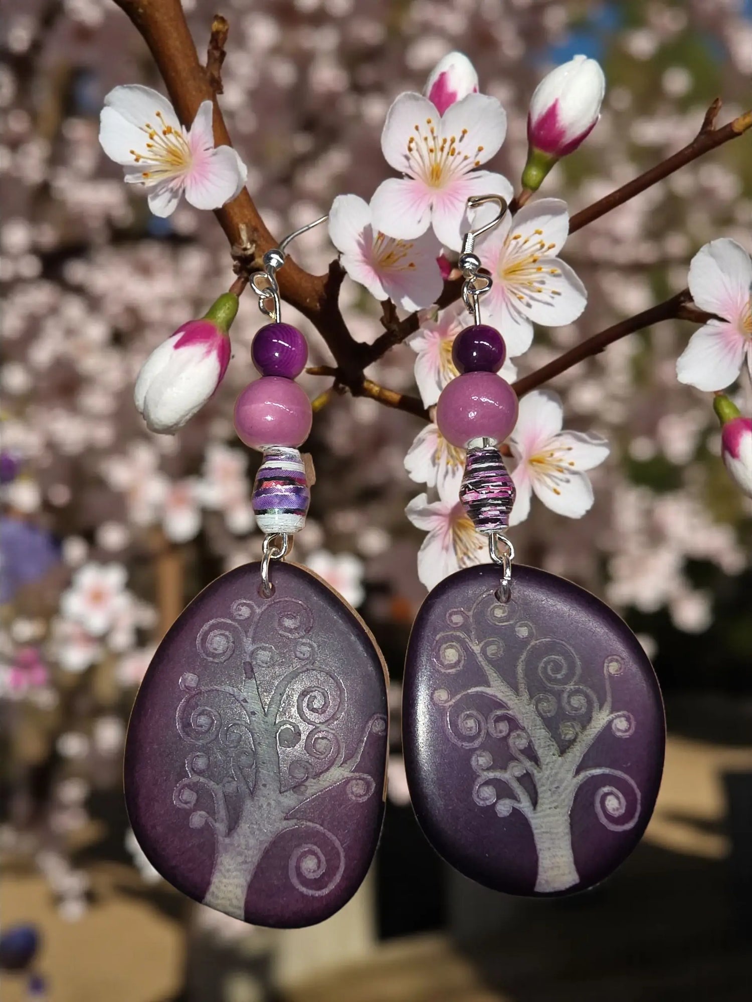 Purple swirly tree engraved tagua slice earrings with purple oval beads and silver tree of life designs