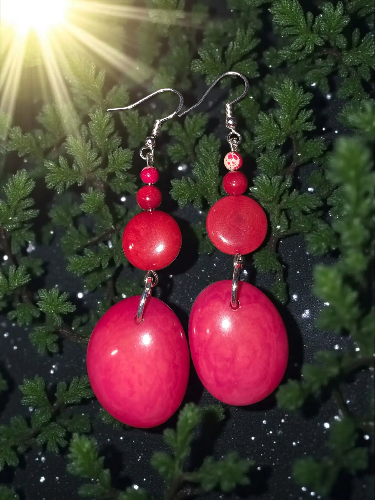 Red drop perfect polished tagua sliced earrings with vibrant red glossy oval beads and silver hooks with smaller matching beads