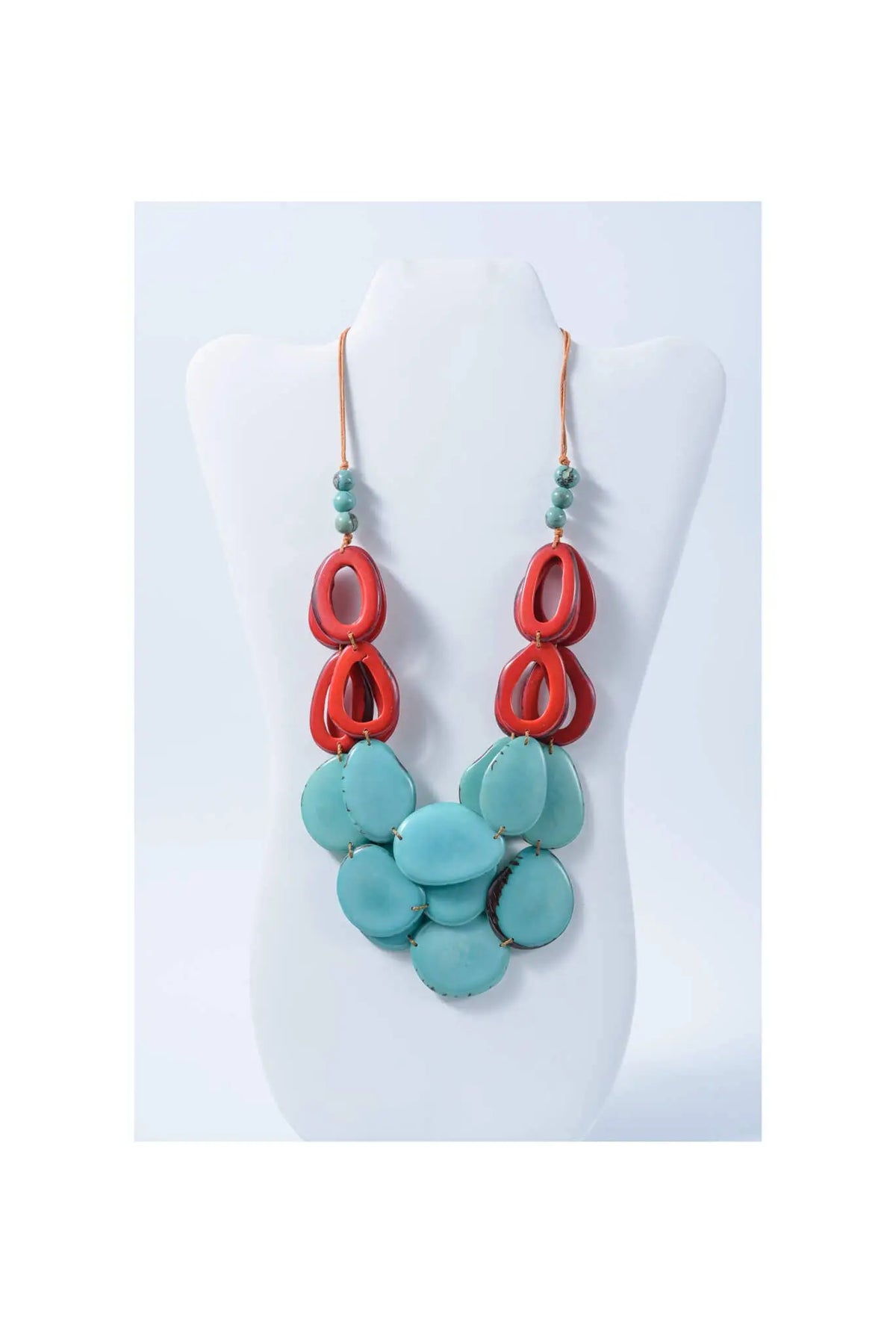 Remy vibrant tagua necklace with coral and turquoise glossy oval beads and loop accents layered style