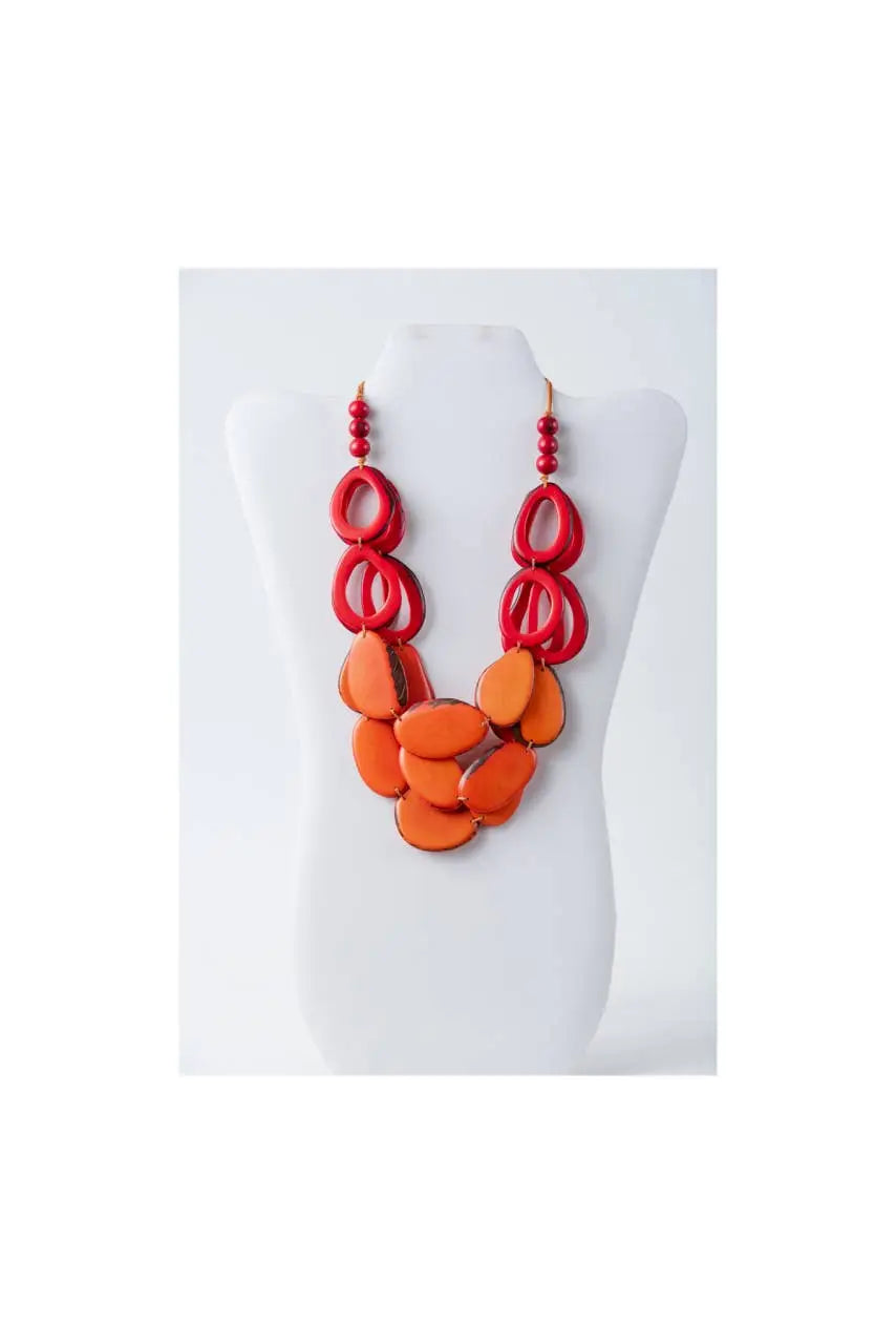 Vibrant red and orange layered remy tagua necklace with bold glossy resin beads and loop accents in olive green and beige