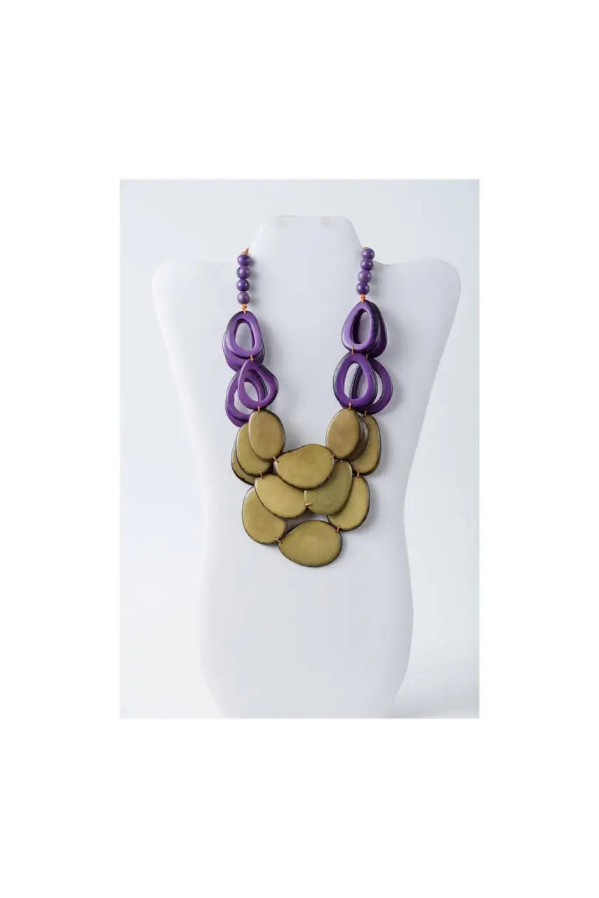 Remy vibrant tagua necklace in olive green and beige with purple and gold layered oval beads and dangling ring accents