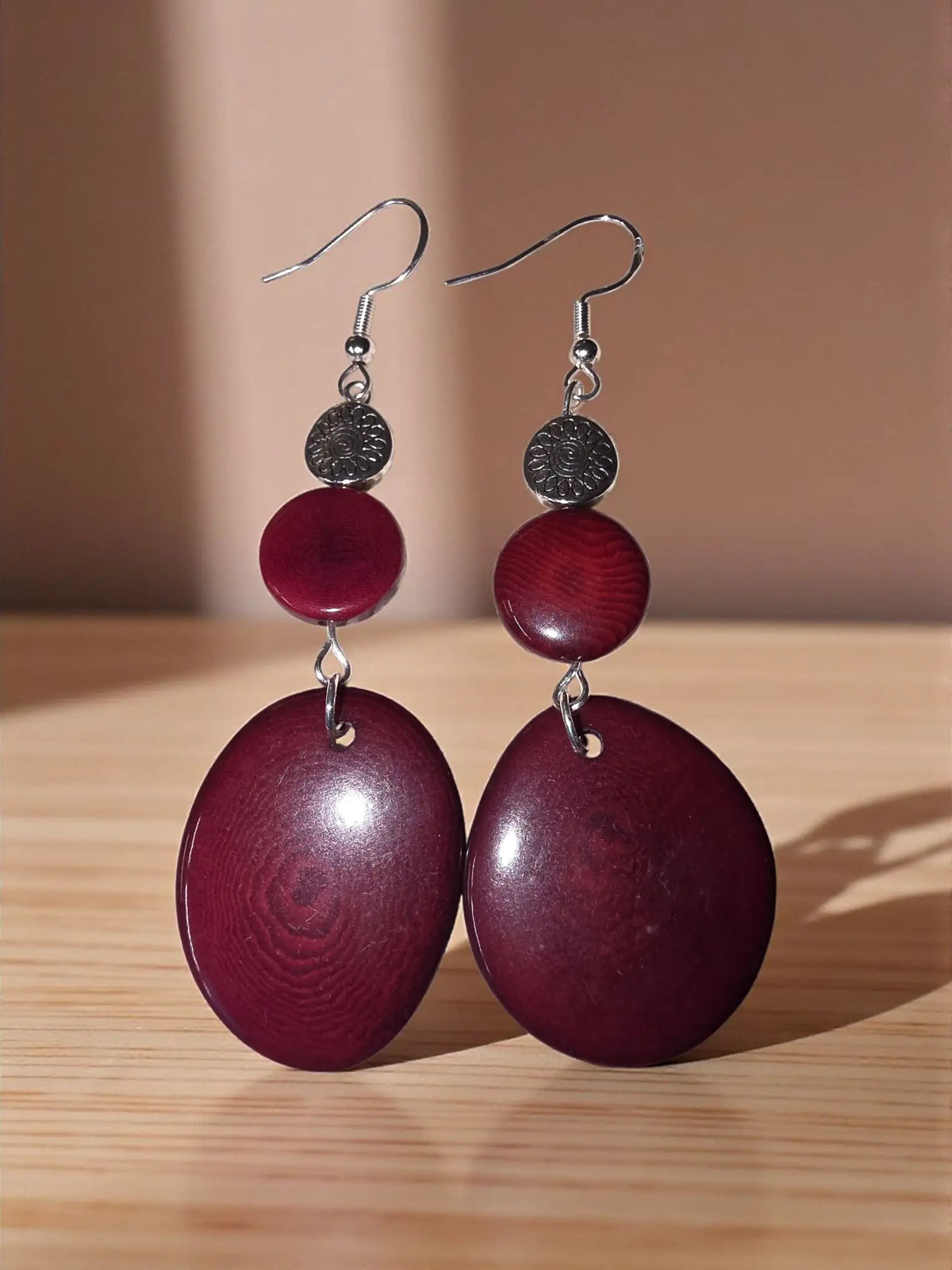 Rich burgundy red wine tagua sweet handmade earrings with glossy stacked circular beads and silver-toned hooks