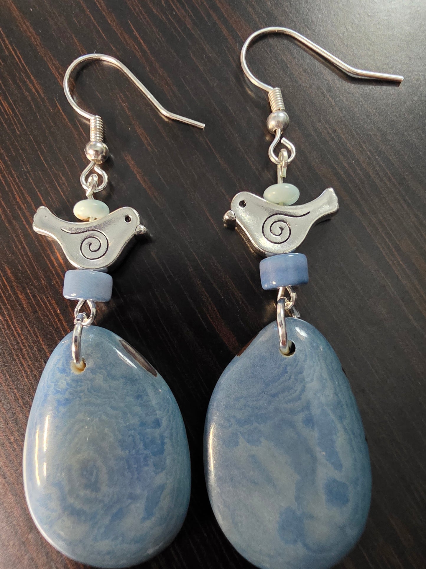 Heather Blue Tagua Grain Earrings with Silver Swirl Birds