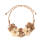 Rosalia necklace pastel multi beige and tan shell flower statement necklace with braided cord for stylish wear