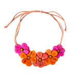 Rosalia necklace pastel multi vibrant floral statement necklace with layered pink orange flower charms on tan suede cord