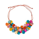 Rosalia necklace pastel multi with vibrant multicolored flower-shaped shell pendant on soft pink suede cord