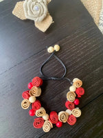 Red and beige rose bracelet with wooden beads and adjustable cord perfect for fall fashion 2025 wearable art accessory