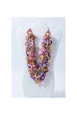 Vibrant scarf tagua necklace with three-stranded chunky chain links in pink orange yellow and blue organic tagua necklace