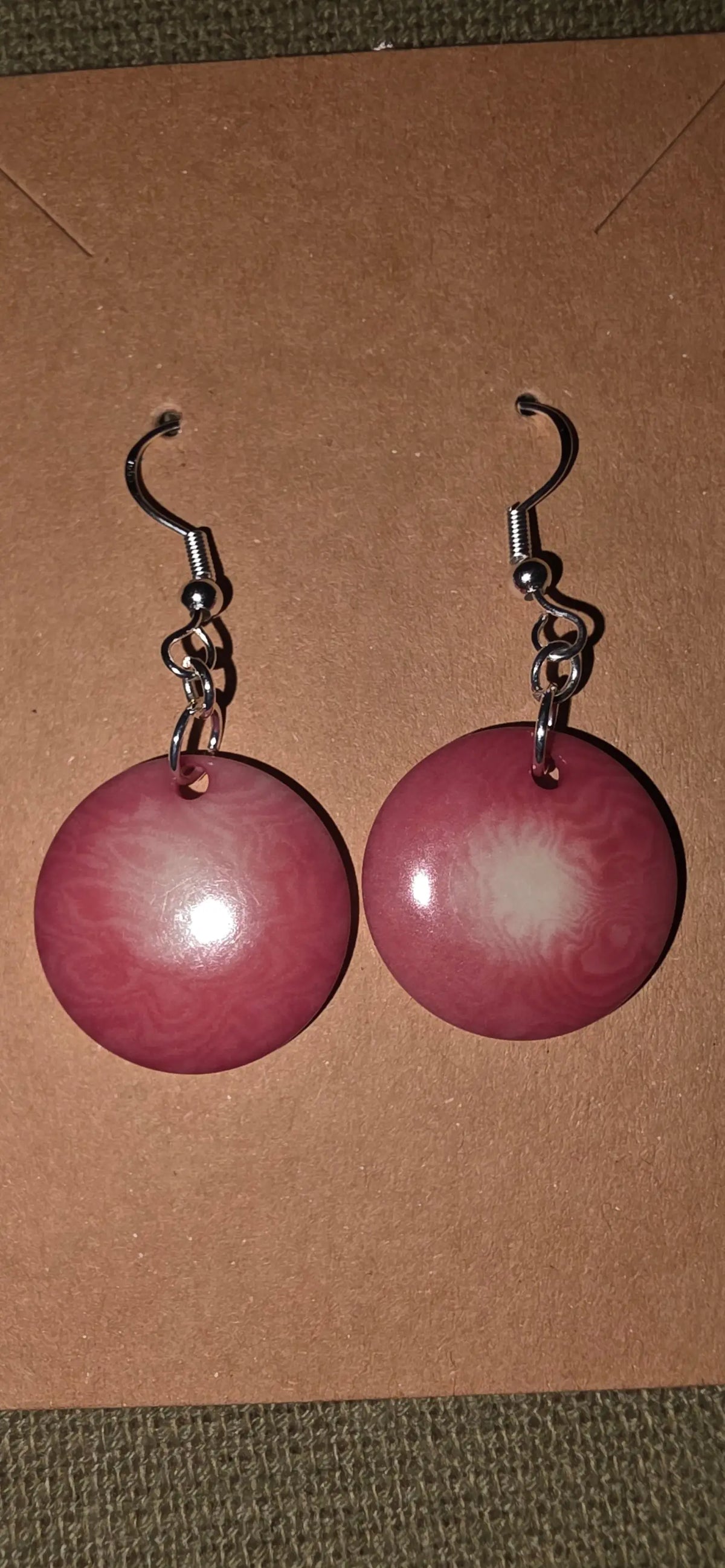 Simple pink misty collection circular wooden earrings with silver hook clasps made from vegetable ivory eco-friendly material