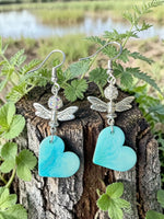 Silver dragonfly earrings with sky blue turquoise heart pendants carved from tagua vegetable ivory from the rainforest