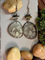 Gray pebble sweet songbird singing on a vine engraved tagua earrings with white bird vine etchings layered beads and silver hooks