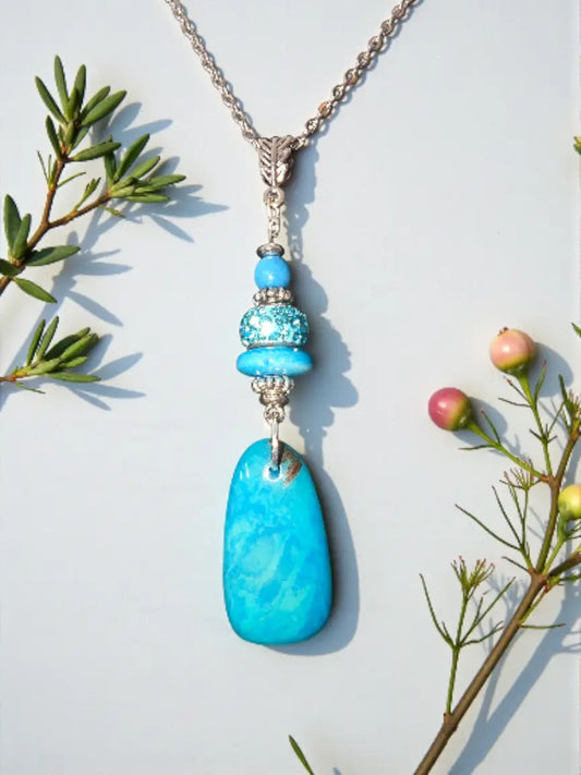 Turquoise blue sustainable tagua nut pendant necklace with silver chain and decorative beads fair trade eco friendly gift