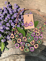 Colorful wild orchid eden three stranded tagua necklace set with purple green and beige geometric beads and earrings
